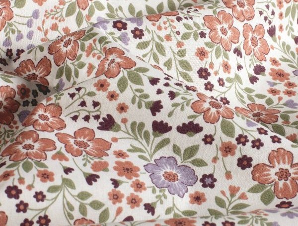100 % Baumwolle , Blüten in mauve, weiß